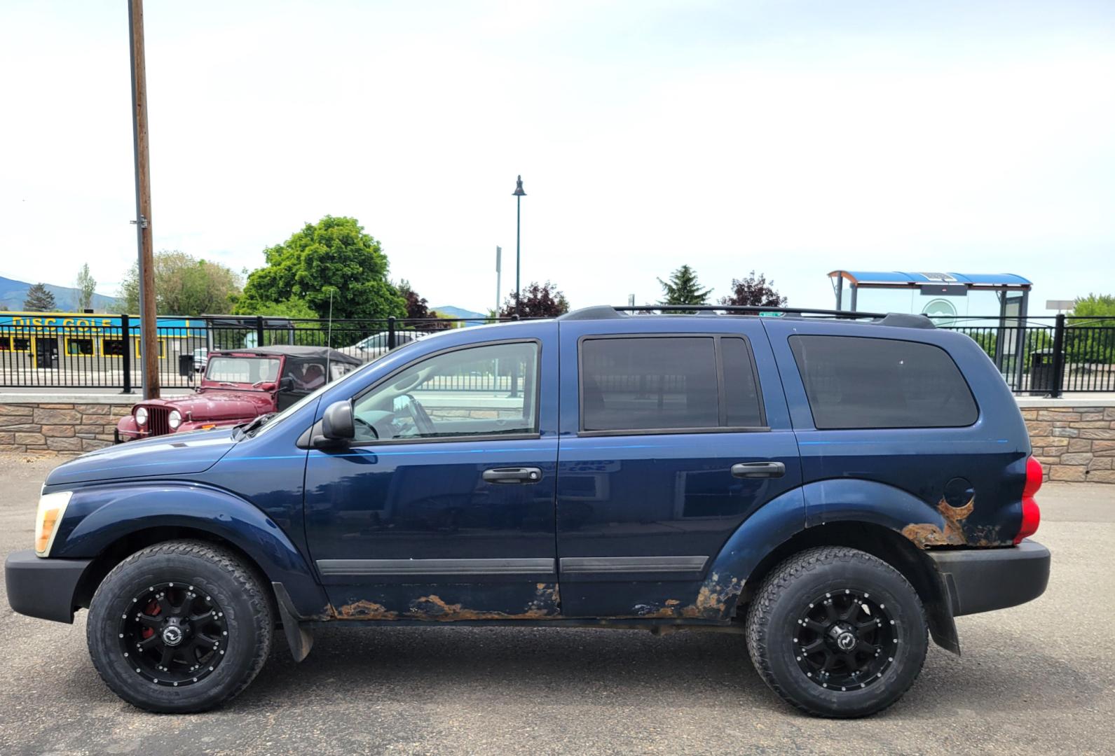 2005 Blue /GrAY Dodge Durango ST (1D4HB38N05F) with an 4.7L V8 engine, Automatic transmission, located at 450 N Russell, Missoula, MT, 59801, (406) 543-6600, 46.874496, -114.017433 - Looks a little rough but runs well. 4 Wheel Drive Works. 4.7V8 Engine. Automatic Transmission. 3RD Row Seating. Nice Wheels. Power Windows and Locks. Does have a Check Engine light on P0058. financing is NOT Available. - Photo#4